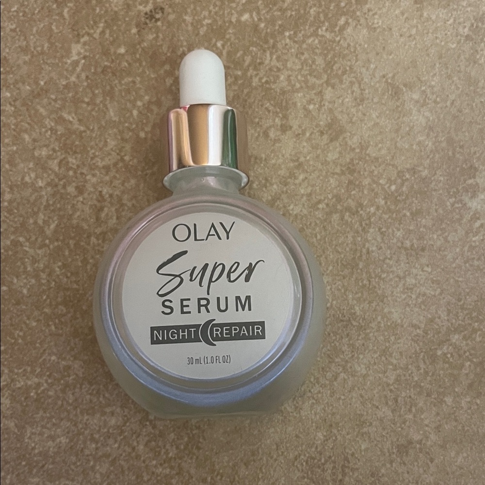 OLAY Super Serum Night Repair in Silver and White